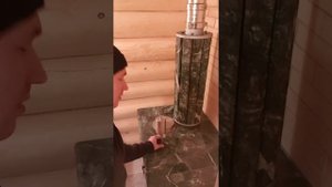 Портал для банной печи ИзиСтим в облицовке из змеевика.