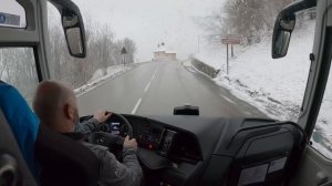 Bus drive in the Alps, snow season,  4K