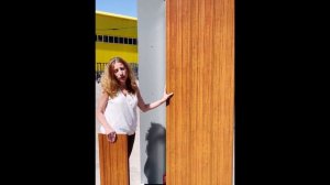 Фасад под дерево из алюминиевой рейки