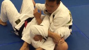 Breaking the armbar/armlock grip brazilian jiu-jitsu