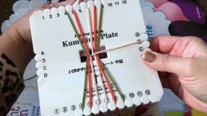 Плетеный браслет Кумихимо.