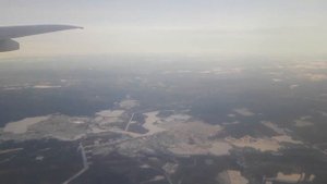 город Полевской с высоты.самолет летит на юг.