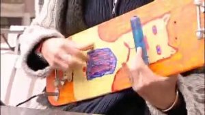 Guitar made from a skateboard and old telephone receiver