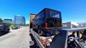 Погрузка авто с эвакуатора в фуру)))УАЗ