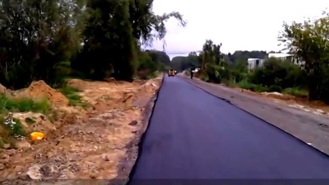 Асфальтирование дорог асфальтоукладчиком