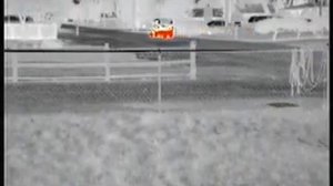 FLIR Scout PS24 of a car driving on a street, in Instalert mode 1