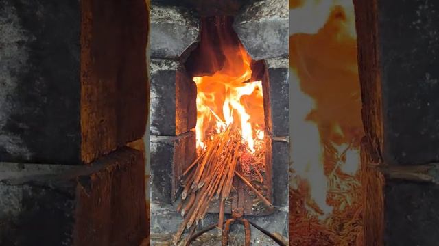 The earthen stove in the countryside, the crackling sound of firewood burning