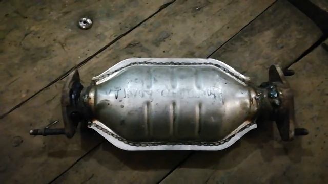 Замена катализатора на пламягаситель на Киа Спектра!!!