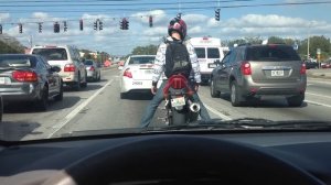 WORLDS BEST Motorcycle Popping Locking and Dropping it, at a Stop light