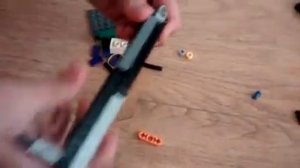 Как сделать пистолет из лего который стреляет на 20-25 метров любым снарядом