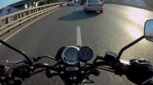 Bajaj Avenger 220 street. On highway with passenger