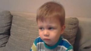 Вот мой маленький братик носки снимает