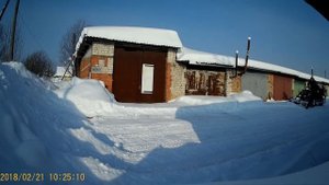 Чистка снега в гаражах квадроциклом-погрузчиком, часть 1.