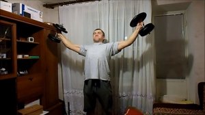 Крест с гантелями по 24кг. Iron cross with 24kg dumbbells.