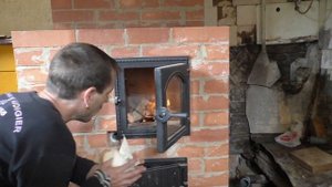 Первая растопка печи после её возведения..