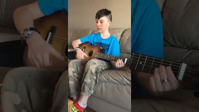 Boy playing guitar