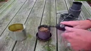 Самодельная походная печь длительного горения сделанная своими руками из консервных банок