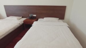 Хунь Чунь, номер в гостинице Бао-Е