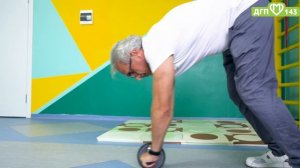 Упражнения на гимнастическом колесе