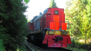 ТЭМ18ДМ-517 с пригородным поездом Дружинино — Михайловский Завод