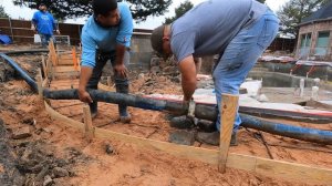 Small deck on a really big pool. Pumping concrete with Muddyfeet