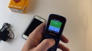 РАСПАКОВКА ЛУЧШИЙ КНОПОЧНЫЙ НОВЫЙ ТЕЛЕФОН ЗА 1500 рублей филипс