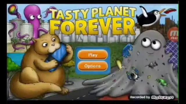 Гиганский кот  сжирает планету.Tasty Planet...Вкусная Планета!!!!