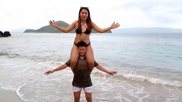 shoulder ride challenge by the beach
