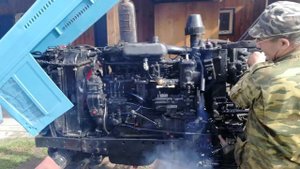 Заводим трактор Беларусь.
