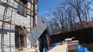 Монтаж подсистемы под навесной фасад.