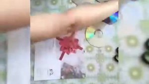 Мастер класс по изготовлению рамки из компакт дисков.