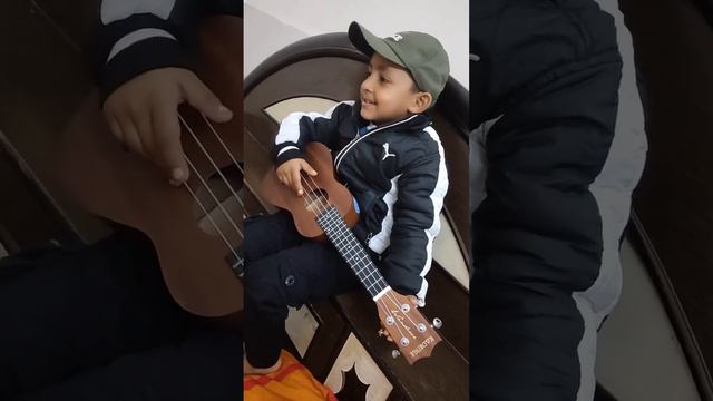 Kids playing guitar