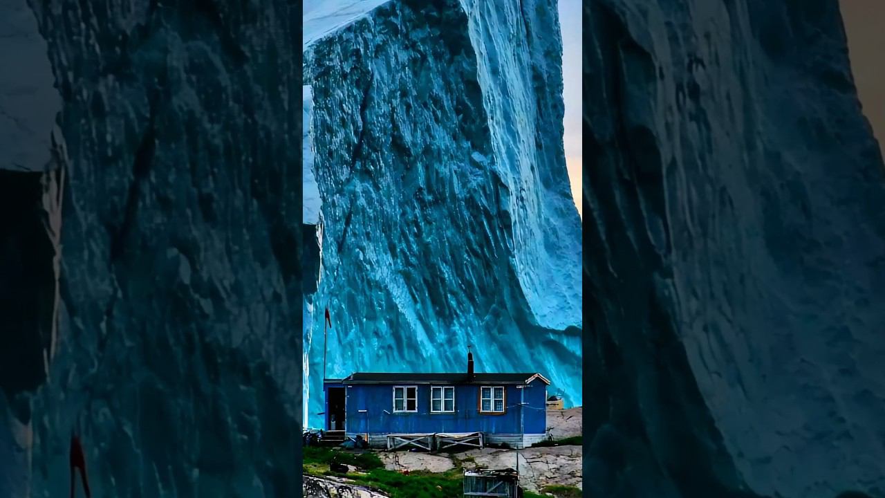 Домик на фоне айсберга в Гренландии смотреть онлайн