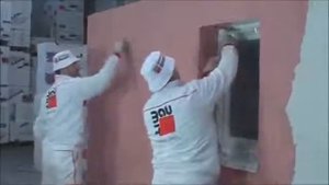 Нанесение фасадной декоративной штукатурки