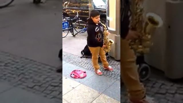 Talented Kid playing the Saxophone Near KaDeWe in Berlin