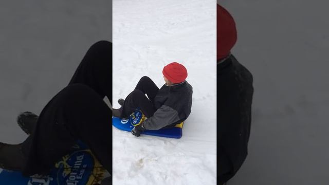 Snow Sledding on the Boogie Board