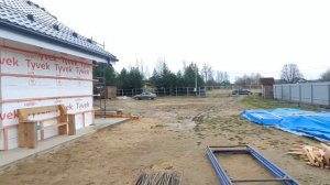 Начали отделку фасада фиброцементным сайдингом. Замер забора.