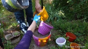 Идея для дачи из цветочных горшков. Поделки для сада и дачи