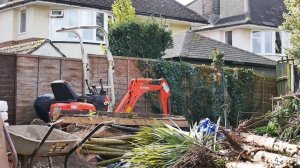 Preparing a patio base - new lawn - digger-  new project - limestone slabs