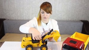 Самосвал MAN с колёсным бульдозером FR 130 Bruder