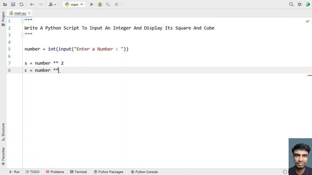 Write A Python Script To Input An Integer And Display Its Square And Cube