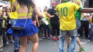 BRAZILIAN GIRLS DANCERS DANCE SAMBA AT BRAZILIAN PARADE CARNIVAL STREET PARTY