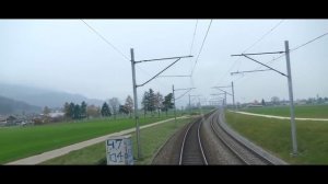 Видео поездка с видом на озеро в Швейцарии из окна кабины машиниста грузового электровоза