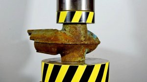 HYDRAULIC PRESS AGAINST CAST IRON RADIATOR