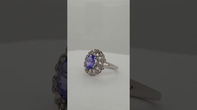 Tanzanite & Diamond ring in 14 K White Gold