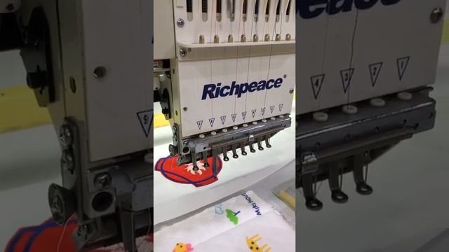 stitching sewing embroidery quilting machine is doing testing for logos