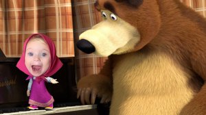 Девочка похоже на Машу из мультика. Мама говорит девочке, что нельзя пока кушать конфету.