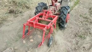 Мотоблок МТЗ с вибрационной копалкой.