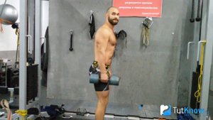 Шраги с гантелями - техника выполнения упражнения