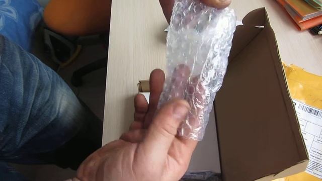 распаковка посылки из Китая запчасти для iPhone смотреть онлайн